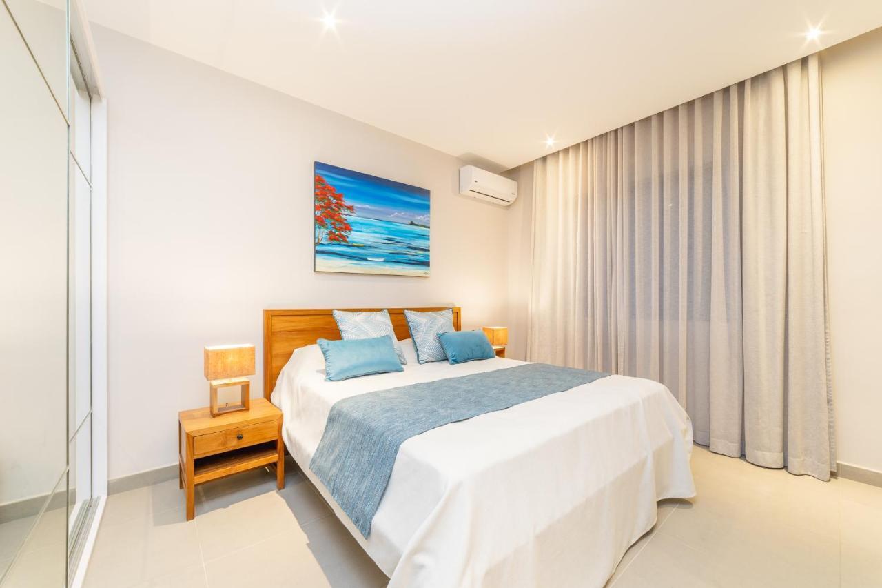 Penthouse 13 - One Bay Residence With Private Rooftop Terrace And Dip In Pool Pereybere Beach Eksteriør billede