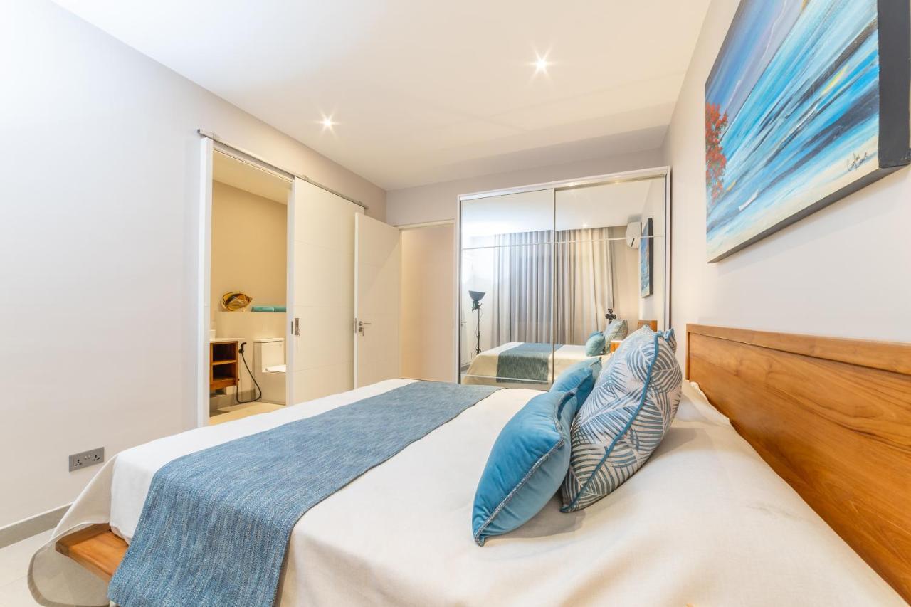 Penthouse 13 - One Bay Residence With Private Rooftop Terrace And Dip In Pool Pereybere Beach Eksteriør billede